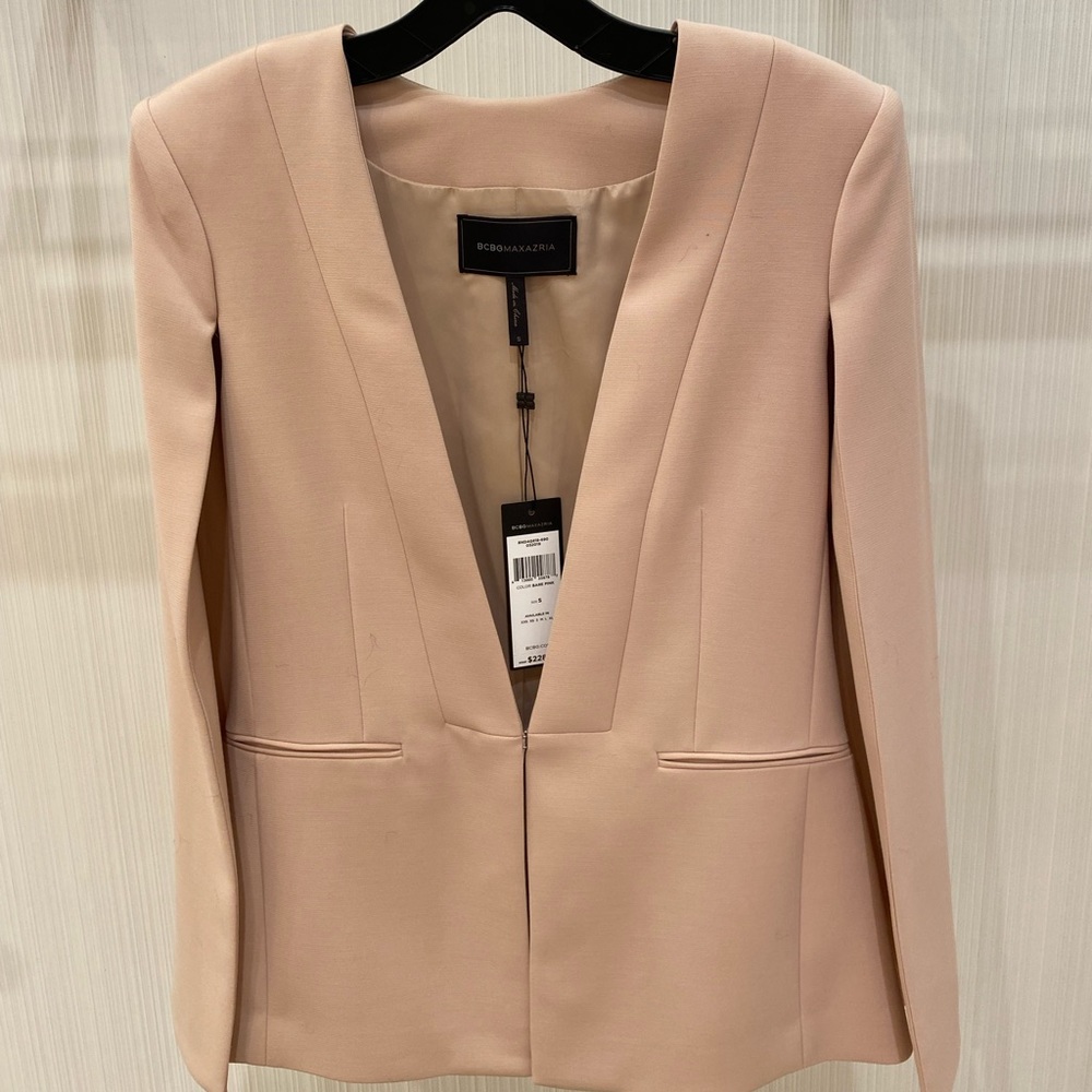 Woman’s BCBG pink jacket cape